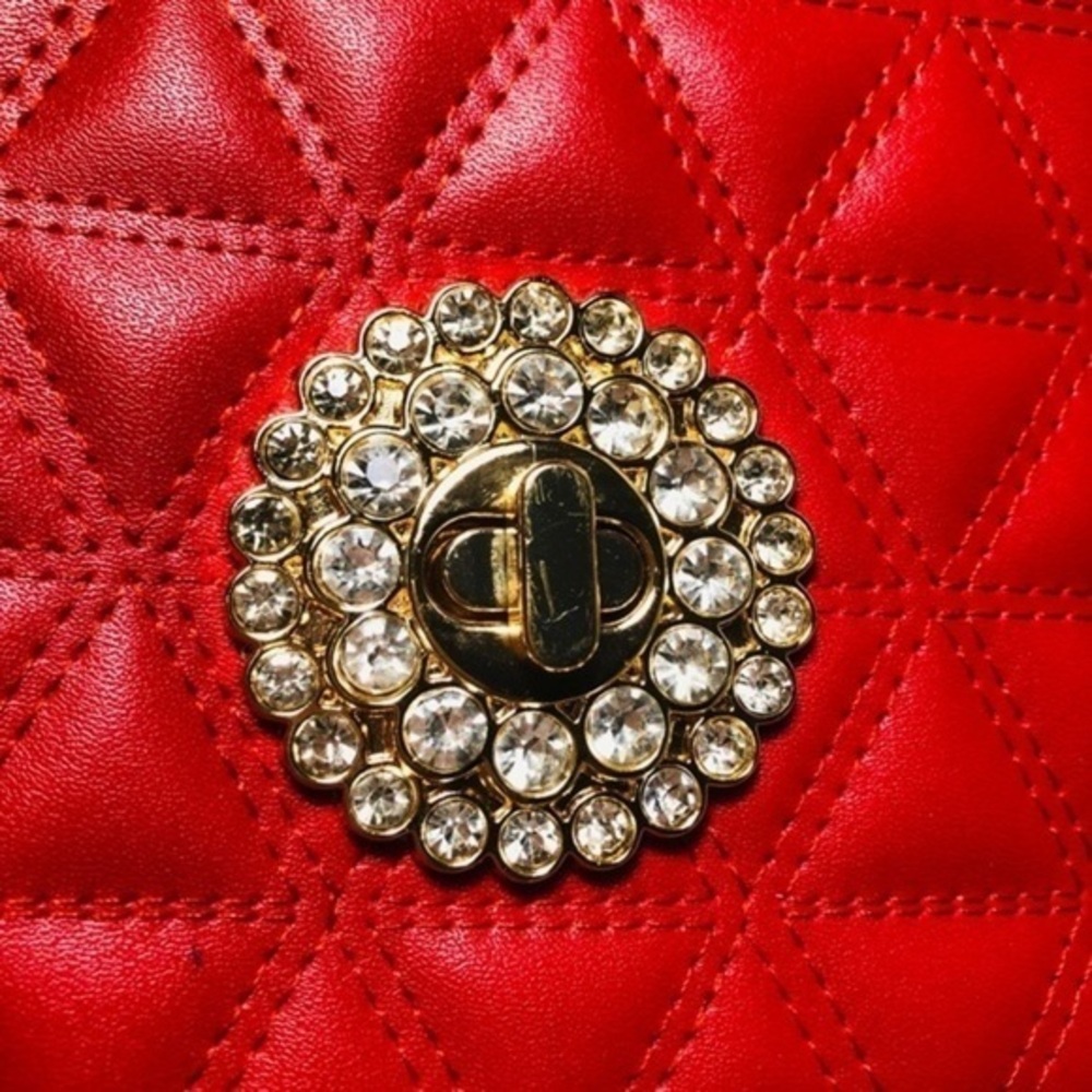 Red evening bag. Long gold strap